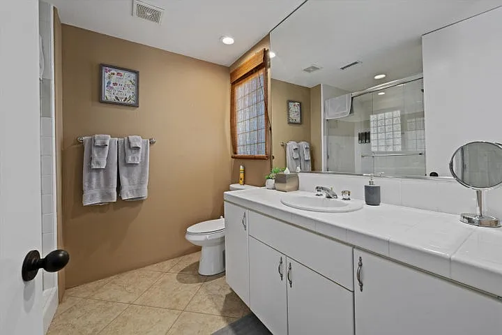 En Suite bathroom for detached casita. Full tile walk in shower.
