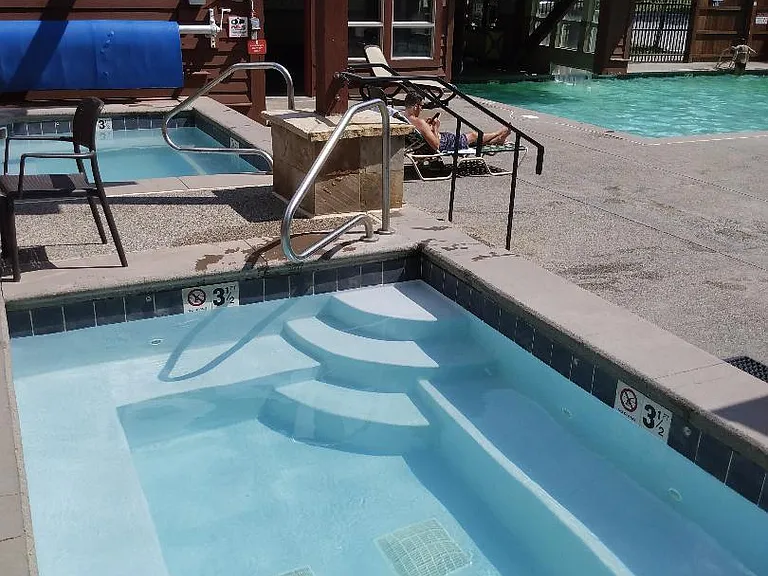 2 outdoor hot tubs at community pool