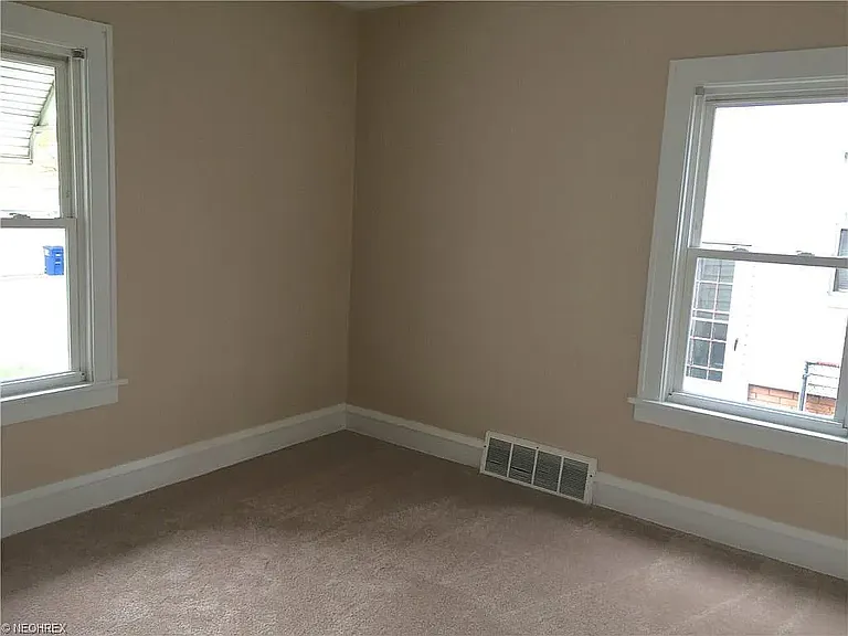 Second carpeted room- perfect for an office or a second bedroom
