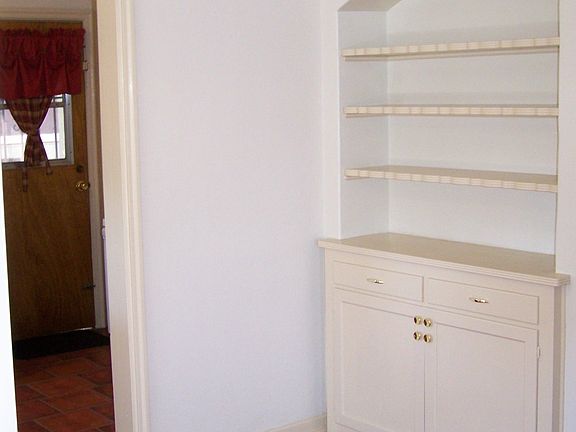 Formal dining room with built-in china cabinet