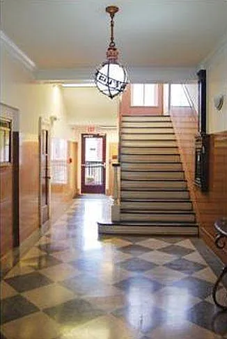 Lobby. Back door leading to parking space