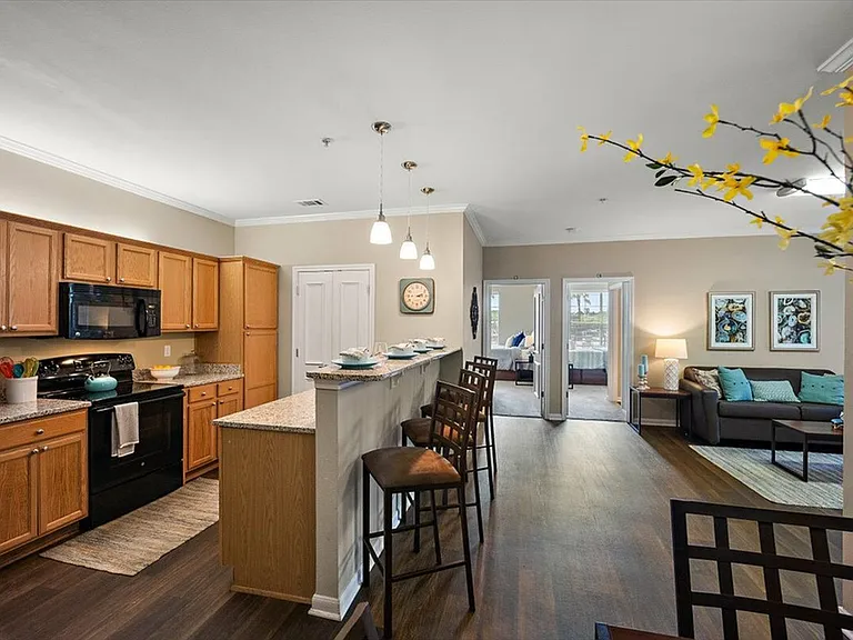 Enjoy Open-Concept Living with a Spacious Kitchen and Modern Appliances at Eagle Flatts Apartments in Hattiesburg
