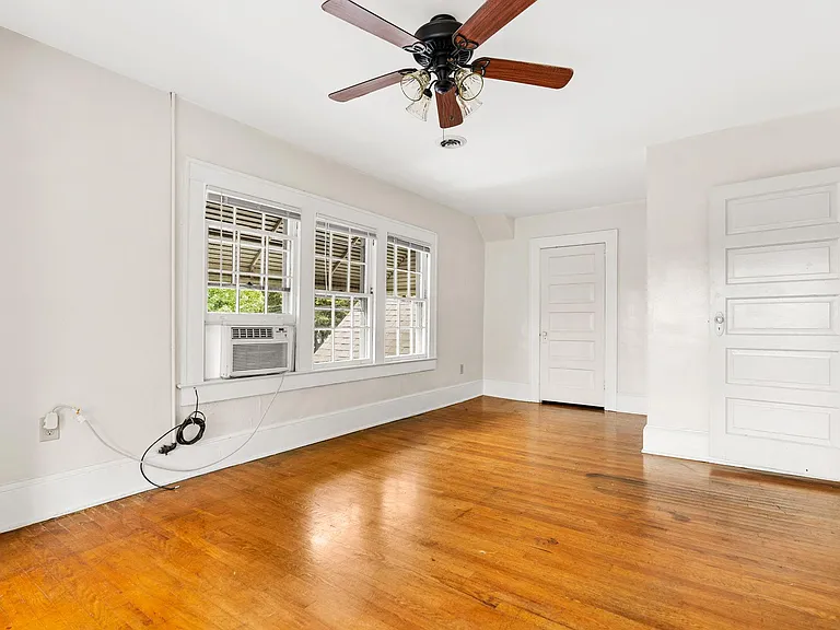 Large front bedroom / living room or bonus space. See floor plan for measurements.