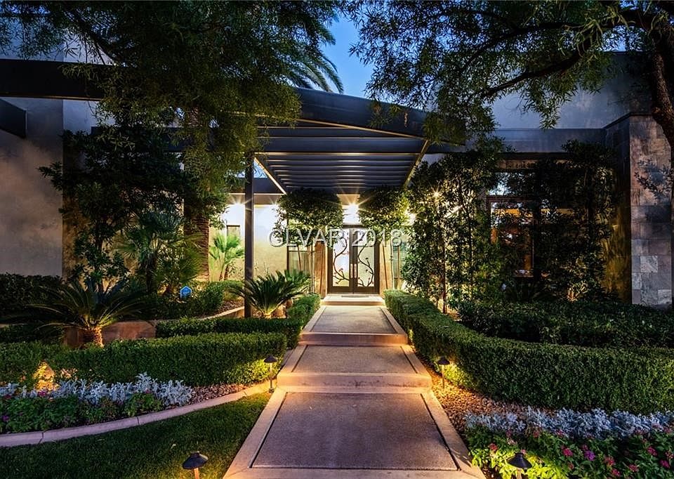 Lush curb appeal and a beautiful alluring entry.
