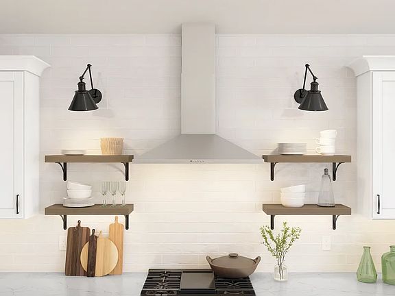 Kitchen with floating shelves and stainless steel hood