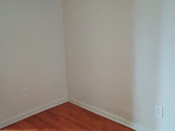 Room between living room and kitchen to be used as study or dining room