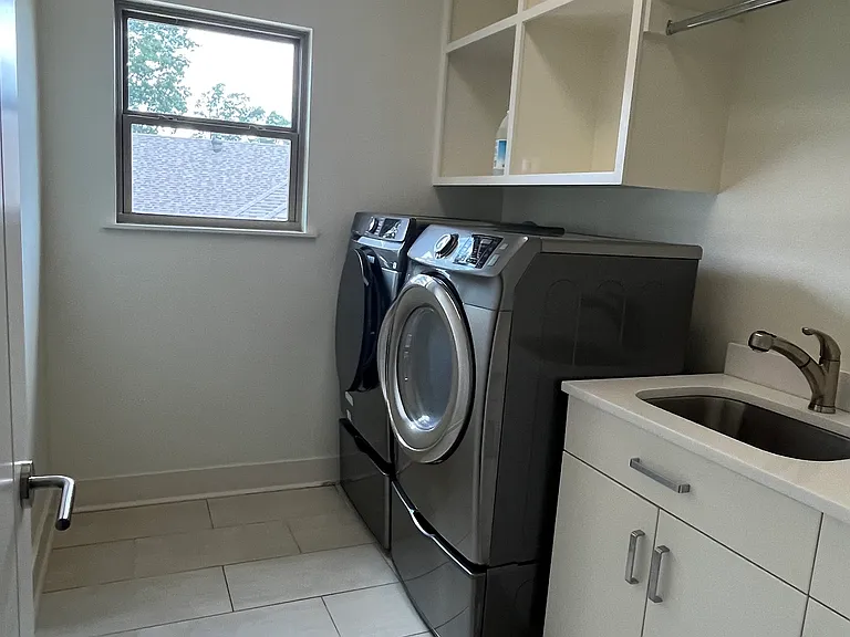 Laundry room with washer and dryer