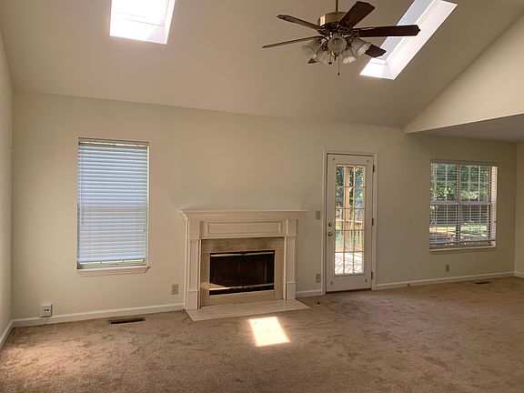 Living room with vaulted ceiling