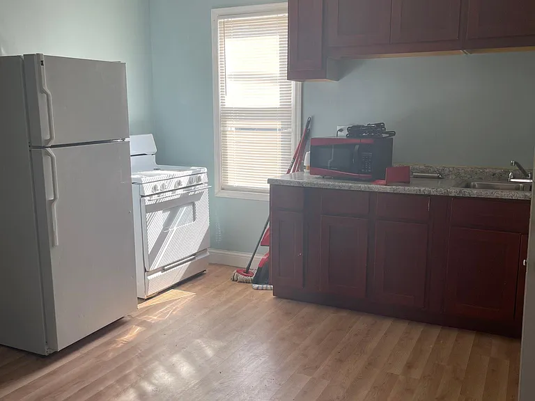 7917 S Coles Ave — Photo 2