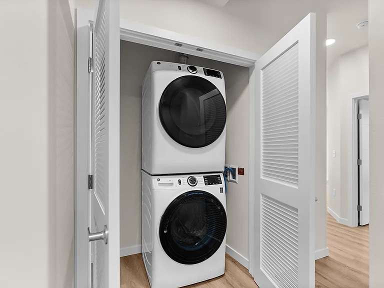 In-home stacked laundry for everyday convenience. In-home stacked laundry for everyday convenience.