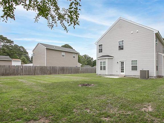 Huge Backyard with plenty of room for a firepit or play area for the kids.