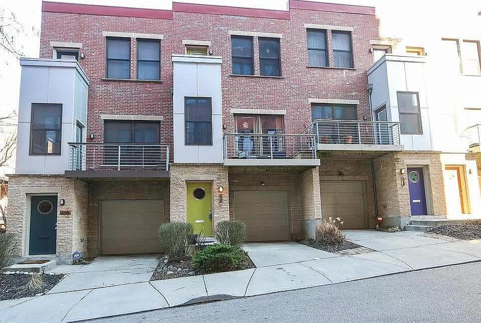 Is the middle Unit with the light green door