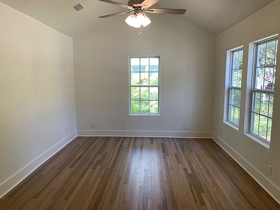 Living room located directly across kitchen