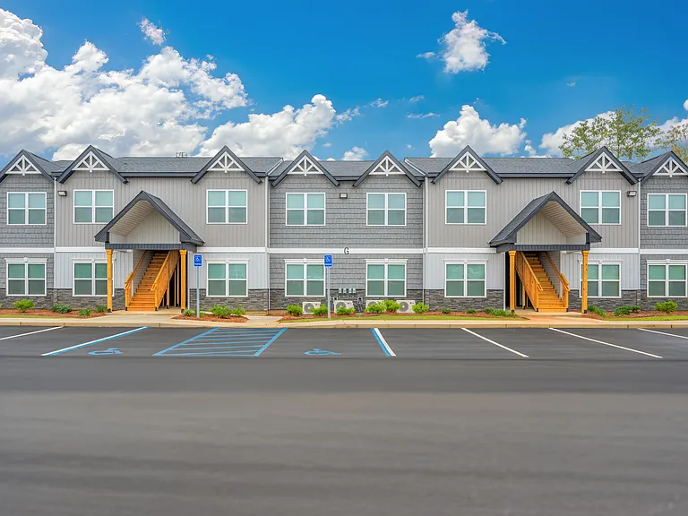 Well-maintained exterior in a peaceful setting, offering a quiet and comfortable living environment.
