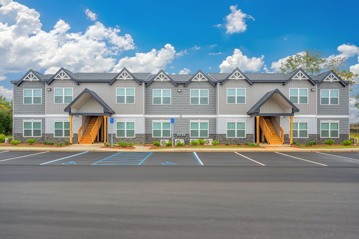 Neatly kept exterior offering a quiet, comfortable living environment.