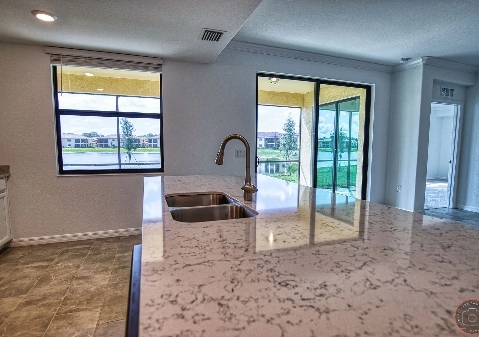 Annual Unfurnished Rental Coach Home 3 Bedrooms, 2 Baths, 2 Car Garage, with Resort Like Amenitie... — Photo 2
