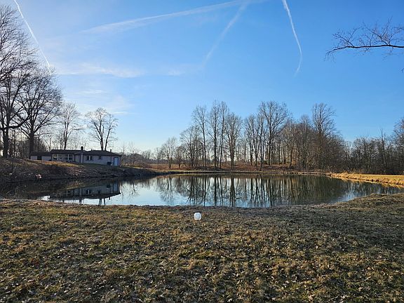 View from the East of the pond looking up to the house