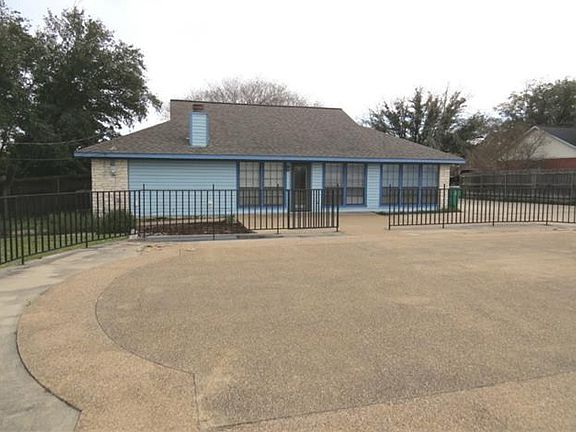 backyard where pool was filled in.