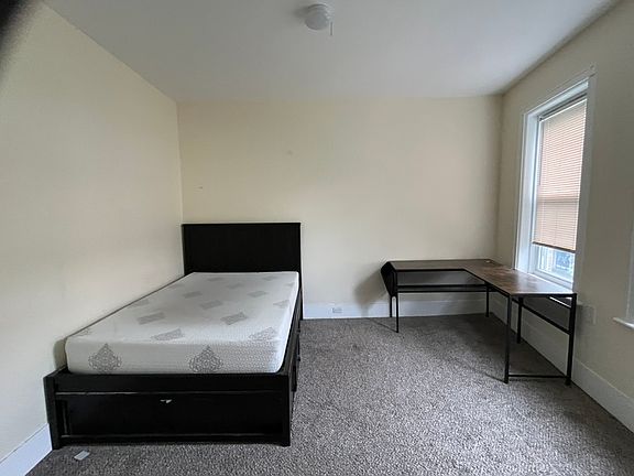Additional front parlor room; could be used as a fourth bedroom.