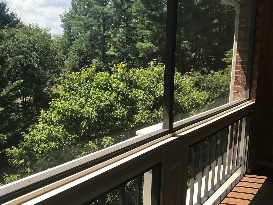 Two screened-in porches with great private views and sunny.