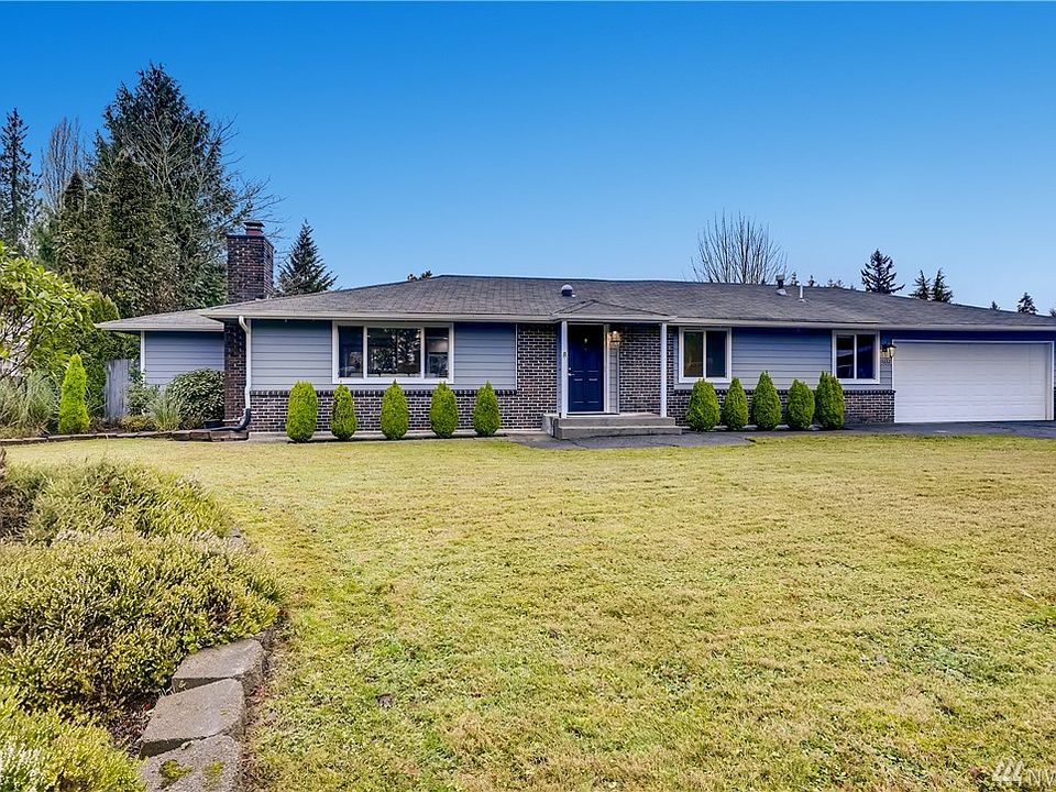 Martha lake rambler located on a large flat lot
