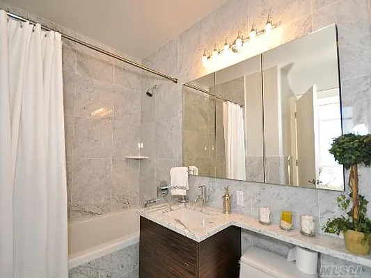 Sold by Douglas Elliman | media 18