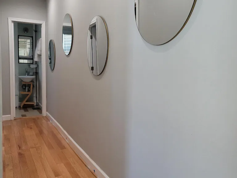 Hall leading to beds 2 & 3 and bath