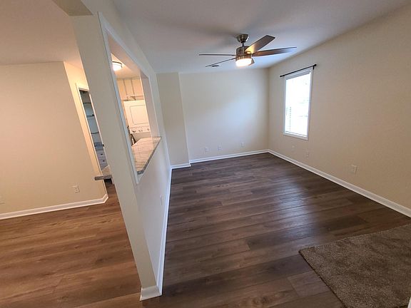 View of Living Room and Kitchen from front bedroom.