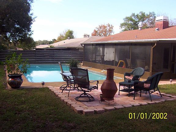 paver deck beside pool