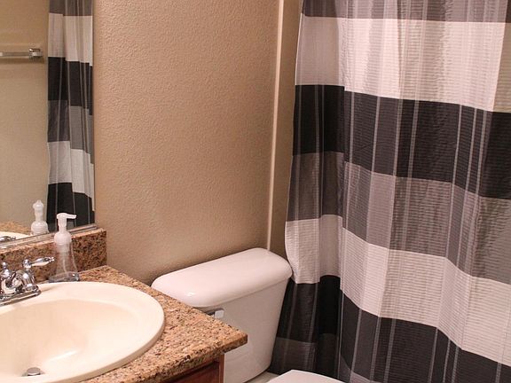 Downstairs full bath conveniently located next to downstairs bedroom