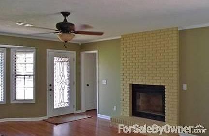 Living room
						:
						Living room features bay window & wood burning fireplace.