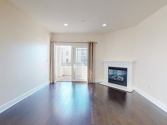 Living Room - Fireplace and large patio