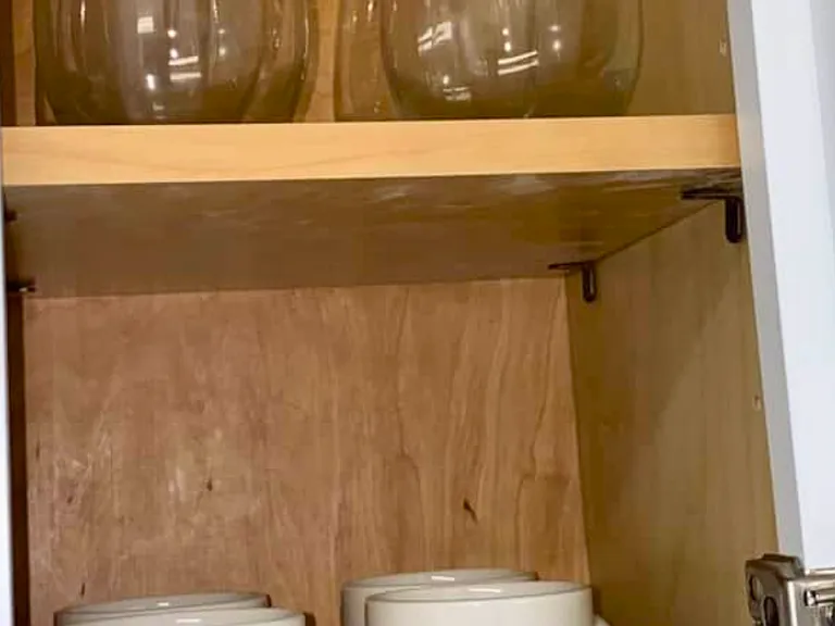 Elegant glassware and mugs for your convenience.