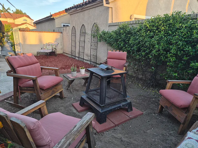 backyard sitting area with fire pit