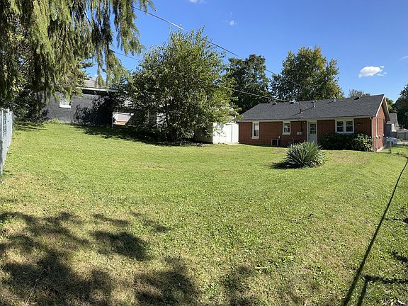 Large backyard with storage shed.