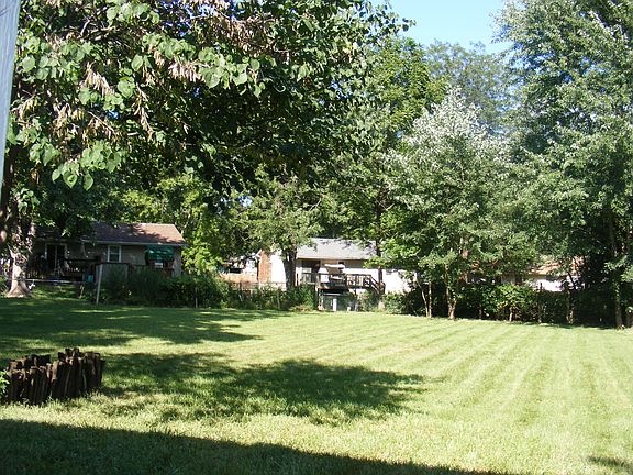 Back yard from back deck. Can't get it all in one photo fro