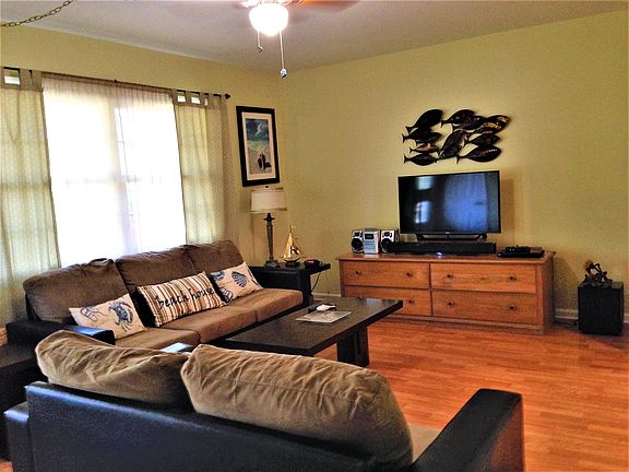 Spacious living room with cable and lg flat screen TV, stere