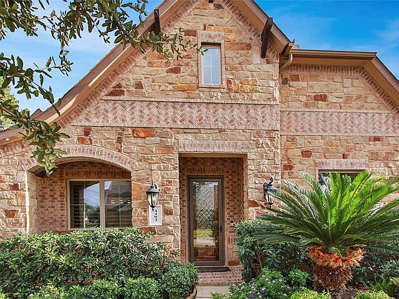 Intricate brick and stone accents, storm door and dual coach lamps greet you. Well landscaped and full sprinklers.