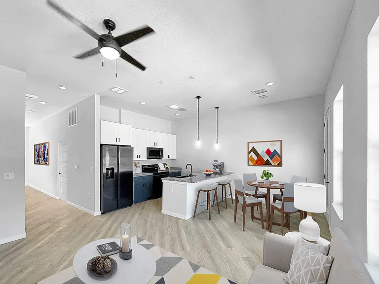 Experience modern comfort in this open-concept kitchen and living space, perfect for gatherings.
