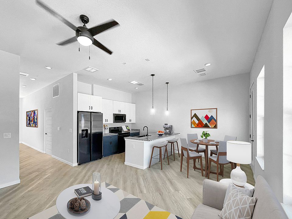 Experience modern comfort in this open-concept kitchen and living space, perfect for gatherings.
