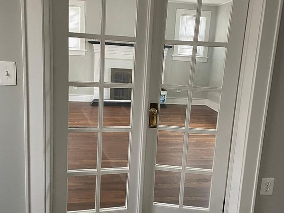 French doors lead to Family room with fire place