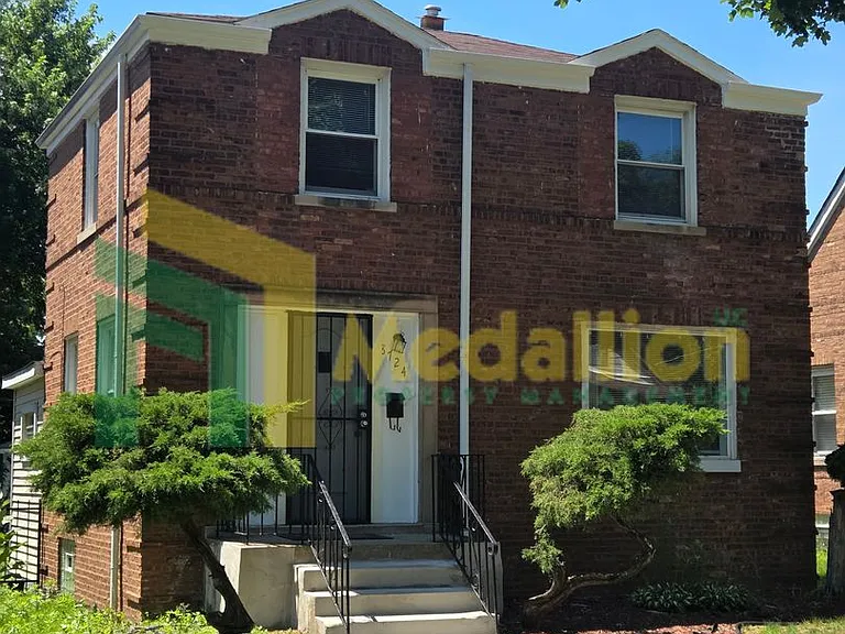 8724 S Eggleston Ave — Photo 1