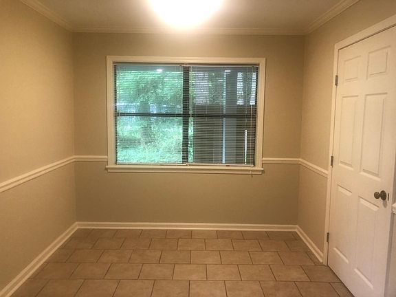 Dining area large enough for table that seats six to eight.