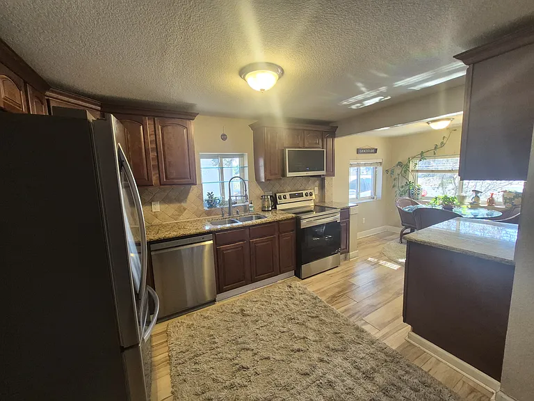 1178 S Quitman St — Photo 5