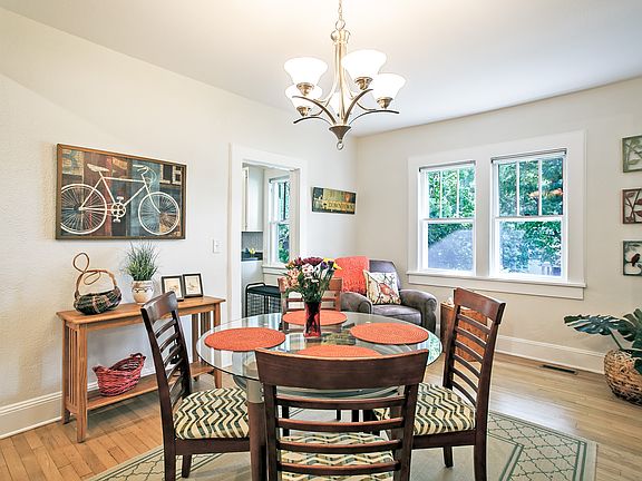 There is a spacious, light filled dining room, right off of the kitchen.