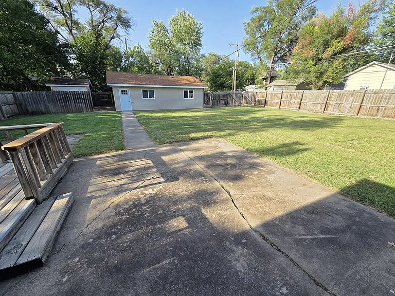 Back patio and detached garage / shop