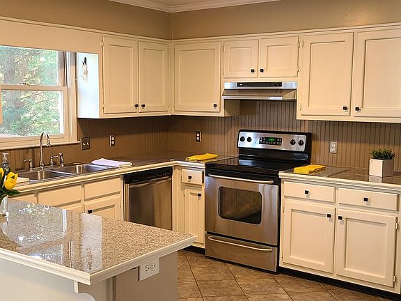 Spacious kitchen with plenty of counter space and storage