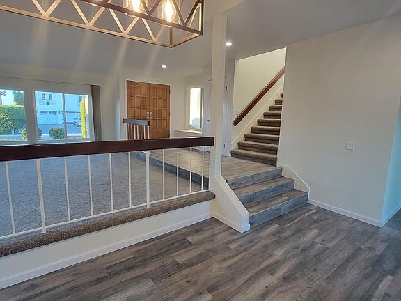 Dining room view of living room & stairs