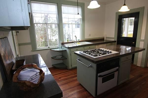 very cute and functional kitchen off front porch