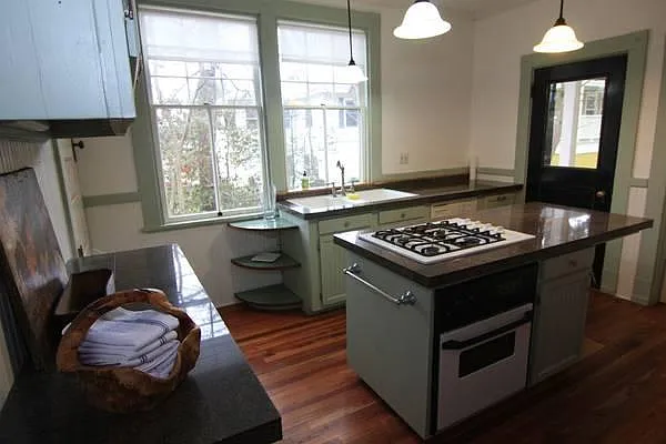 very cute and functional kitchen off front porch